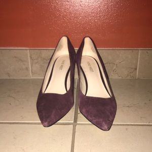 Plum pointed pumps